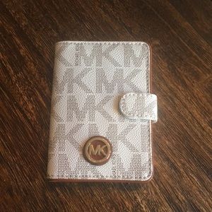 Michael Kors wallet/passport case.